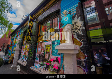 OSLO, NORWAY - 8 JULY, 2015: Graffiti street art on the walls of buildings in popular artistic area Brenneriveien at Grunerlokka. Stock Photo