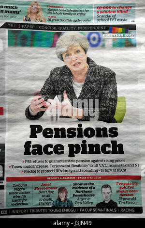 Prime Minister Theresa May on front page of the i Weekend newspaper headline 'Pensions face pinch' 23 April 2017 London UK Stock Photo