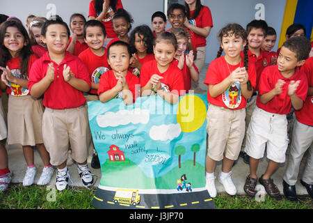 Miami Florida,Spanish Lake Elementary School,International Walk to School Day,student students pupil safety poster contest,parade,Hispanic boy boys,ma Stock Photo