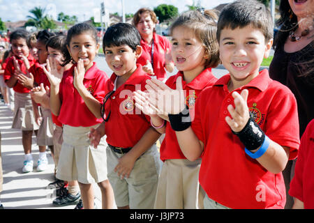 Miami Florida,Spanish Lake Elementary School,International Walk to School Day,student students pupil safety poster contest,parade,Hispanic woman femal Stock Photo