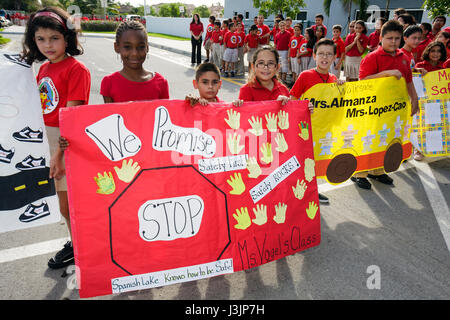 Miami Florida,Spanish Lake Elementary School,International Walk to School Day,student students pupil safety poster contest,parade,multicultural,Black Stock Photo