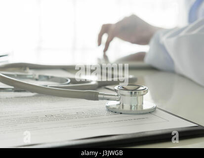 Close-up of stethoscope and medical Documentation on  background doctor working Stock Photo