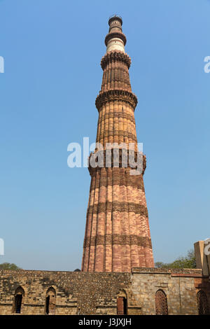 Qutb Minar Delhi is the world's tallest rubble masonry minaret. Qutub Minar and the archaeological ruins form the Qutb complex - A World heritage site Stock Photo