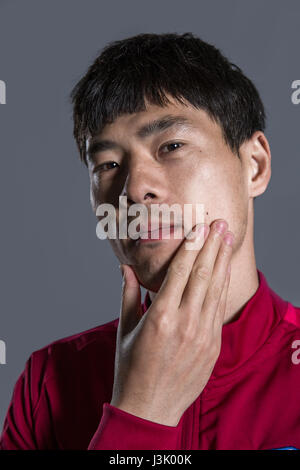 Portrait of Chinese soccer player Liu Huan of Chongqing Dangdai Lifan F.C. for the 2017 Chinese Football Association Super League, in Chongqing, China, 23 February 2017. Stock Photo