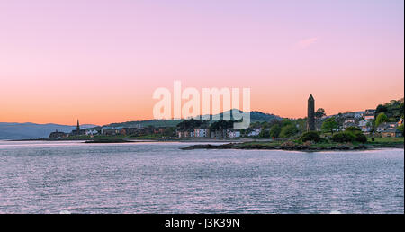 Town of Largs at Sunset and The Pencil Monument. Sugar Loaf Hill is almost centre of image Stock Photo