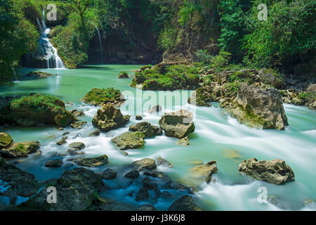 Long exposure of the waterfalls of Semuc Champey, hidden in the Peten jungle of Guatemala. Stock Photo