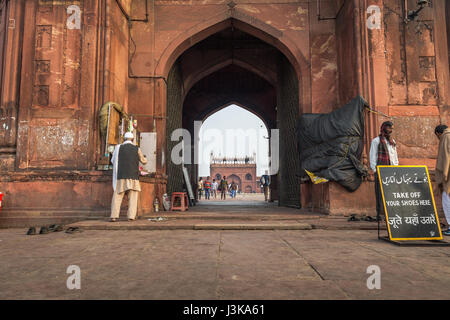 Entrance gate to Jama Masjid Delhi the largest and oldest mosque in India built by mughal emperor Shah Jahan in 1656 AD. Stock Photo