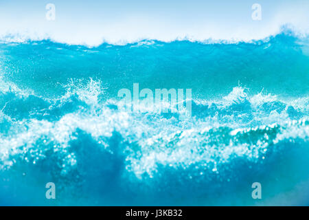 Powerful waves background, beautiful strong waves, perfect for surfing sport, clean blue water, summer vacation on the beach concept Stock Photo