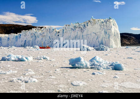 View of the Eqi Glacier in Greenland. Very few places in Greenland are beautiful as this glacier, at 70 km north of Ilulissat, in the Disco Bay. Stock Photo