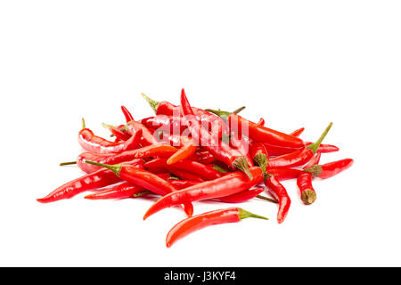 Heap of red chili peppers on white Stock Photo