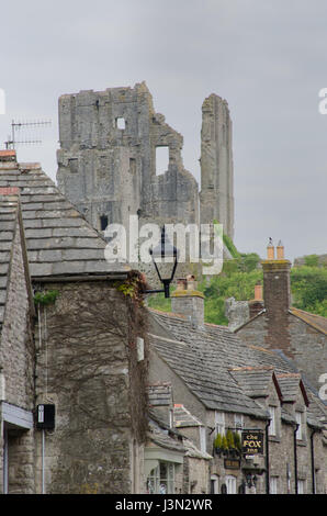 Corfe Castle  Dorset United Kingdom -23 April 2017: Corfe village with castle in background Stock Photo