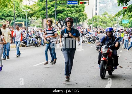 Bolivarian National Police and the National Guard stationed in the streets of Caracas. Opposition march on Wednesday, May 4, in rejection of the 'cons Stock Photo