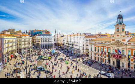 The Puerta del Sol square is the main public square in the city of Madrid, Spain. In the middle of the square is located the office of the President o Stock Photo