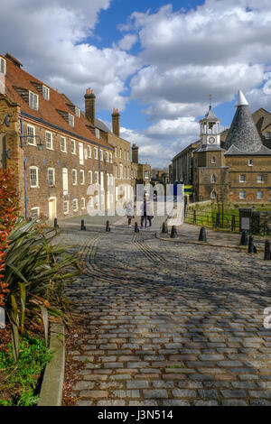House Mill and Three Mills in East London, portrait view taken in Spring. Stock Photo