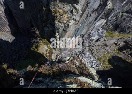 rock climber in the slate quarries above llanberis in 