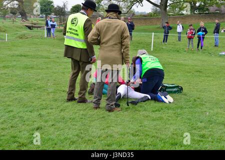 Photo sequence of a spectacular fall at  Keepers Question fence 3  at The Mitsubishi Motors Badminton Horse Trials 2017 with Topwood Beau ( no 43) with English rider Emily Gilruth  (GBR ) taking a tumble. Horse appeared not hurt but Ms Gilruth  the sister of  British Conservative  MP Matt Hancock was concussed and taken away on a stretcher by ambulance men. Stock Photo