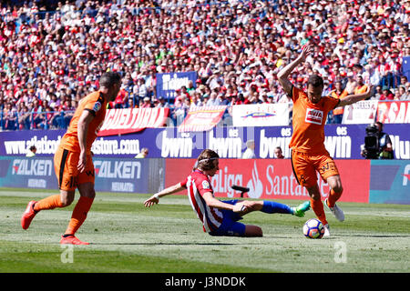 Gonzalo Escalante (5) SD Eibar's player. Filipe Luis Kasmirski (3) Atletico de Madrid's player.La Liga between Atletico de Madrid vs SD Eibar at the Vicente Calderon stadium in Madrid, Spain, May 6, 2017 . Stock Photo