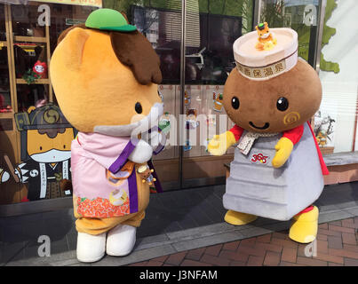 Tokyo, Japan. 30th Apr, 2017. The mascot representing Gumma Province, Gumma Chan (L), and the mascot of the Ikaho Onsen hot springs (R) stand in front of a shop in Tokyo, Japan, 30 April 2017. Mascots, also known as 'yuru-chara', are an important part of Japanese society. Photo: Lars Nicolaysen/dpa/Alamy Live News Stock Photo