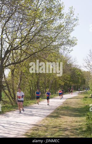 Stratford-upon-Avon, Warwickshire, UK. 7th May, 2017. Runners stretched out along the Greenway, Shakespeare Marathon & Half Marathon, Stratford-upon-Avon, Warwickshire, England, United Kingdom 2017 Credit: Graham Toney/Alamy Live News Stock Photo