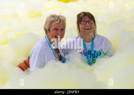 Weymouth, Dorset, UK. 7th May, 2017. Weldmar's Bubble Rush takes place at Weymouth to raise funds for the charity with about 2000 people expected to take part, running through bubbles of different colours. Credit: Carolyn Jenkins/Alamy Live News Stock Photo