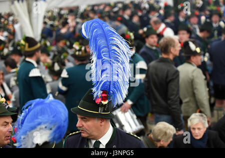 Gaissach, Germany. 7th May, 2017. Members of a traditional Bavarian Gebirgsschuetzen (lit. mountain marksmen) club in a beer tent during traditional Patronatstag feast day celebrations in Gaissach, Germany, 7 May 2017. The meeting takes place every May to honour the patron saint of the Gebirgsschuetzen, Mary the mother of Jesus. Photo: Andreas Gebert/dpa/Alamy Live News Stock Photo