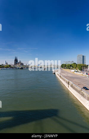The Rhine River in front of the Deutzer Bridge and the cathedral in Cologne in Germany seen from the Severins Bridge. Stock Photo