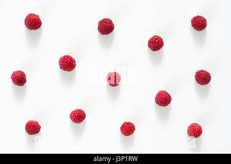 Fresh raspberries on white. Raspberries isolated, flat lay Stock Photo