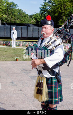 Miami Florida,Bayfront Park,The Moving Wall,Vietnam Veterans Memorial,replica,names,killed in action,opening ceremony,military,war,man men male,bagpip Stock Photo