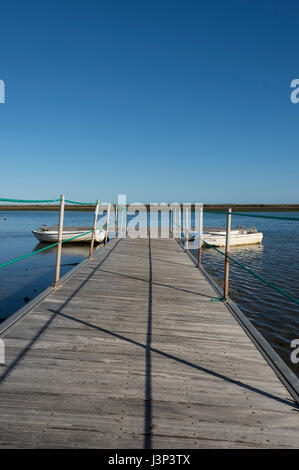 wooden jetty on the  Ria Formosa Natural Park, Portugal. Stock Photo