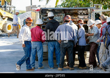 Miami Beach Florida,Ocean Drive,under new construction site building builder,Hispanic man men male,worker,workers,builder,laborer,working,work,employe Stock Photo