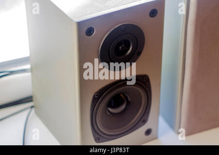 Audio system. Two gray speakers made of wood Stock Photo