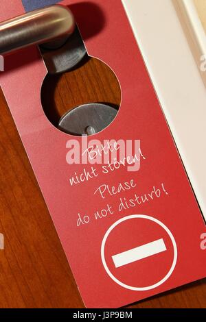 do not disturb sign at the door of a hotel room Stock Photo