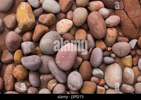 Colourful pebbles on a beach Stock Photo
