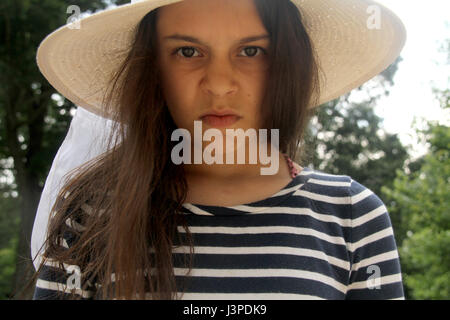 Young girl with upset/ angry expression Stock Photo