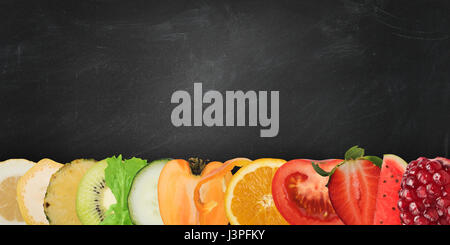Colourful banner of fruits on blackboard background Stock Photo