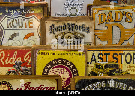 STUTTGART, GERMANY - MARCH 03, 2017: Background of vintage advertising signs. Europe's greatest classic car exhibition 'RETRO CLASSICS' Stock Photo