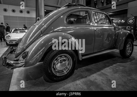 STUTTGART, GERMANY - MARCH 03, 2017: Subcompact Volkswagen Beetle, 1973. Rear view. Black and white. Europe's greatest classic car exhibition 'RETRO CLASSICS' Stock Photo