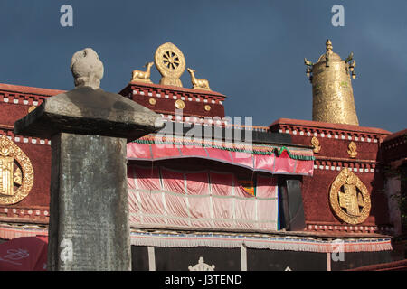 Tang-Tibetan Treaty Pillar and Various other Tibetan Buddhist symbols on Jokhang temple, Lhasa, Tibet Stock Photo