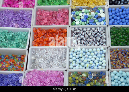Multi colored beads and tools for making jewelry and crafts Stock Photo
