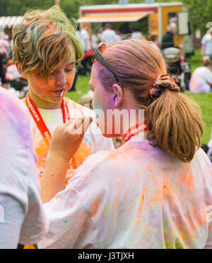 Weymouth, Dorset, UK. 6th May, 2017. Weldmar's Colour Run takes place at Weymouth to raise funds for the charity. Families participate in the event an Stock Photo