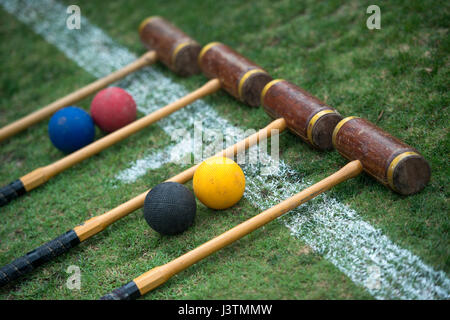 Croquet set laid out ready to play, croquet mallets and balls.Jayne Russell / Alamy Stock Photo Stock Photo