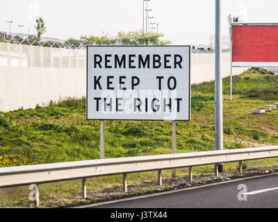 Remember to keep to the right sign at Calais border crossing, France, fro drivers arriving from the UK. Reminding drivers which side of the road to dr Stock Photo