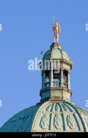Statue of Captain George Vancouver designed by Albert Franz Cizek, made of copper with gold leaf, on top of the British Columbia parliament building Stock Photo