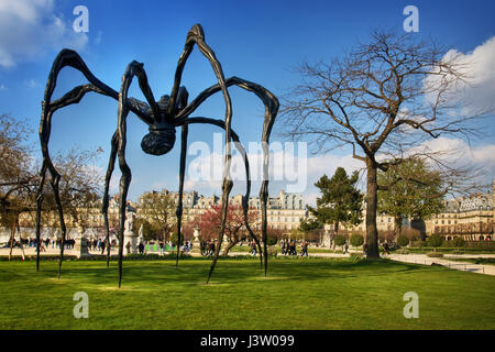 The Maman, a gigantic spider sculpture by Louise Bourgeois, is standing outside at Grand Bassin Rond which is located near Tuileries Garden. Paris. Fr Stock Photo