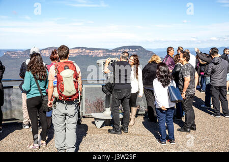 Tourists and visitors at Echo Point lookout in Katoomba,Blue Mountains,Australia looking towards Mount Solitary and the Three Sisters Stock Photo