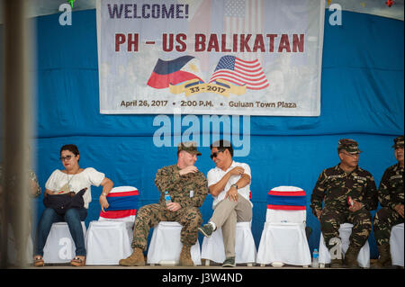 U.S. and Philippine military personnel participate in a groundbreaking ceremony at Surok Elementary School during Balikatan 2017, a bilateral exercise focused on construction, humanitarian assistance, disaster relief, and counterterrorism operations. Stock Photo