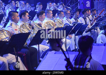 170428-N-CB621-260 SEOUL, Republic of Korea (April 28, 2017) Sailors from U.S. 7th Fleet Band and Republic of Korea (ROK) Navy band perform during a combined concert in the Olympic hall at Seoul Olympic Park. The U.S. Navy 7th Fleet Band was created in 1943 with the establishment of the U.S. Navy 7th Fleet and has performed for thousands of audiences throughout the Indo-Asia-Pacific region. (U.S. Navy photo by Mass Communication Specialist 1st Class Jason Swink) Stock Photo