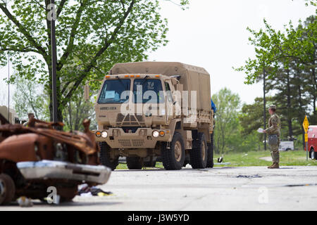 The 45th CBRN Company from Joint Base Lewis-McChord responded to a simulated contamination site during Exercise Guardian Response 17 at Muscatatuck Urban Training Center, Indiana, testing multi-component readiness for chemical, biological, radiological, and nuclear scenarios. Stock Photo