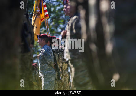 Troopers from the 1st Squadron, 17th Cavalry Regiment, 82nd Combat Aviation Brigade, 82nd Airborne Division, participate in the squadron’s change of command ceremony on Stan Field on Fort Bragg, N.C., May 4. (U.S. Army Photo by Capt. Adan Cazarez) Stock Photo