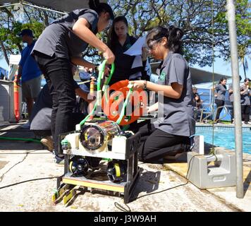 Students from local schools compete in an underwater robotics competition at the Marine Advanced Technology Education Oahu Regional Competition, applying ocean and space technologies. Stock Photo